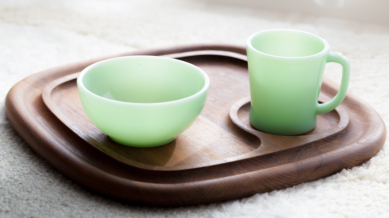 Jadeite dishes on wooden tray