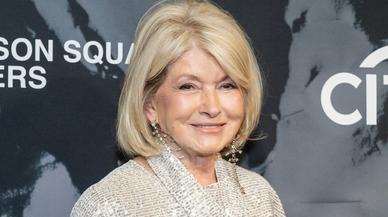 Martha Stewart posing in from of citi sign.