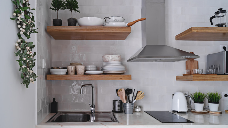 Small shelves on kitchen wall