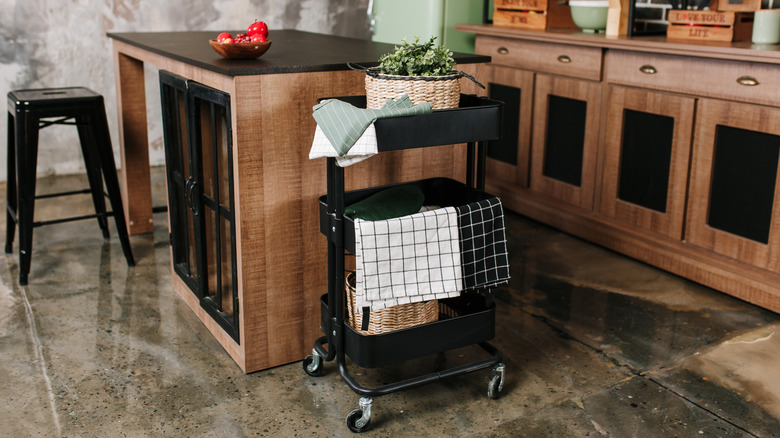 Rolling cart up against a kitchen island