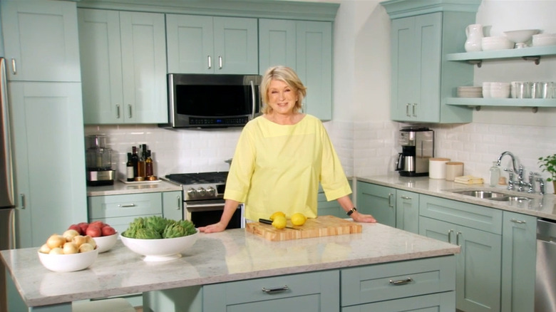 Martha Stewart in her kitchen with shaker-style cabinets
