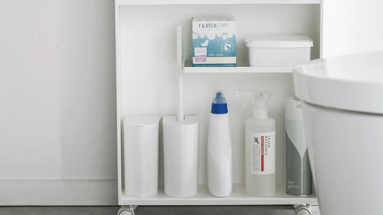 The Yamazaki rolling cart with solid side next to a toilet