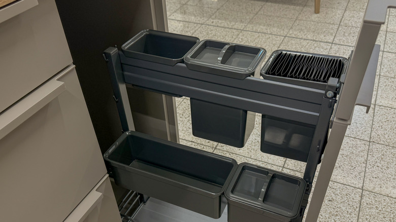 Tall thin cabinet pull out drawer with cubbies