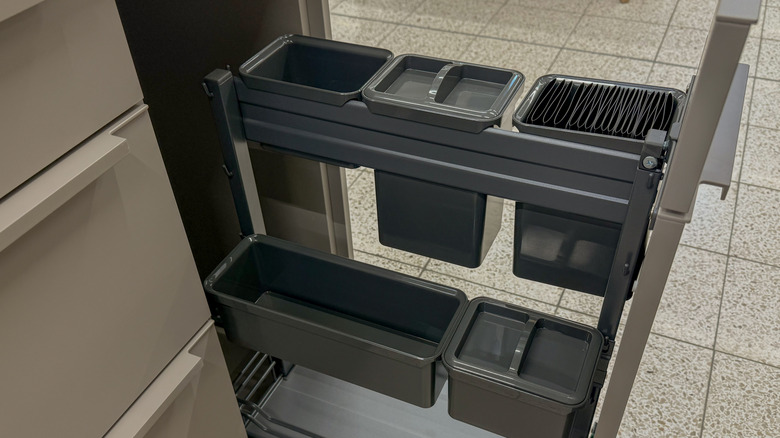 Tall thin cabinet pull out drawer with cubbies