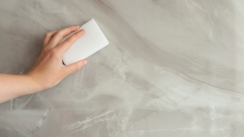 Hand cleaning with melamine foam