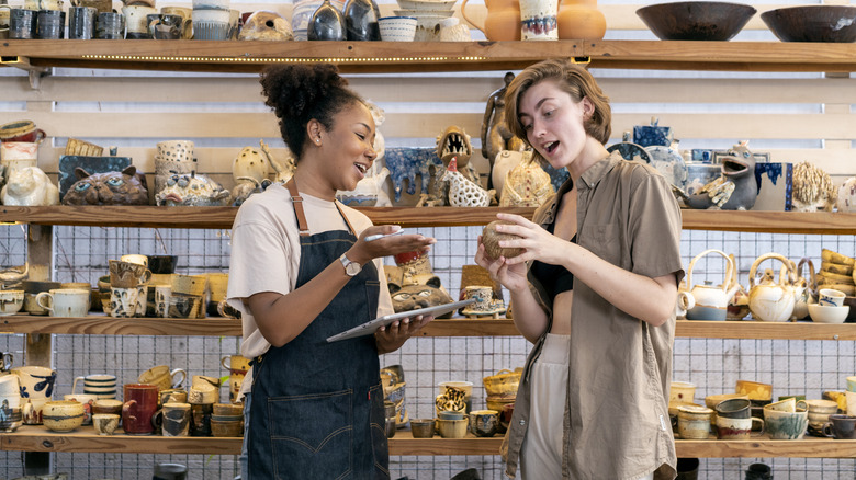 People picking out home decor