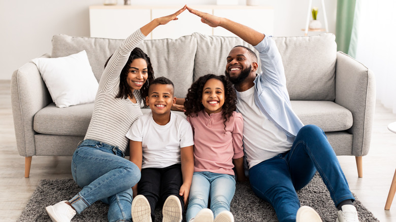 Family under roof in new home