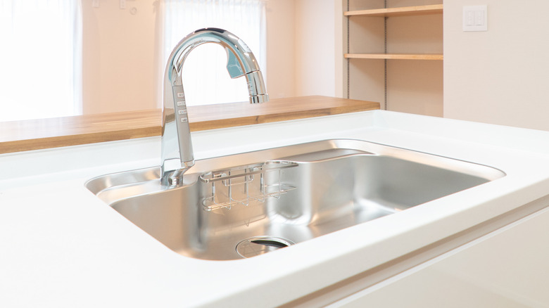 touchless faucet on kitchen sink