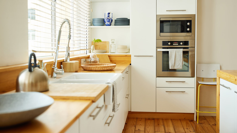 Modern kitchen with white cabinets