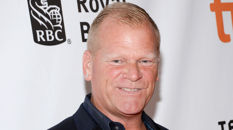 Mike Holmes photographed smiling at the "Long Time Running" premiere during the 2017 Toronto International Film Festival