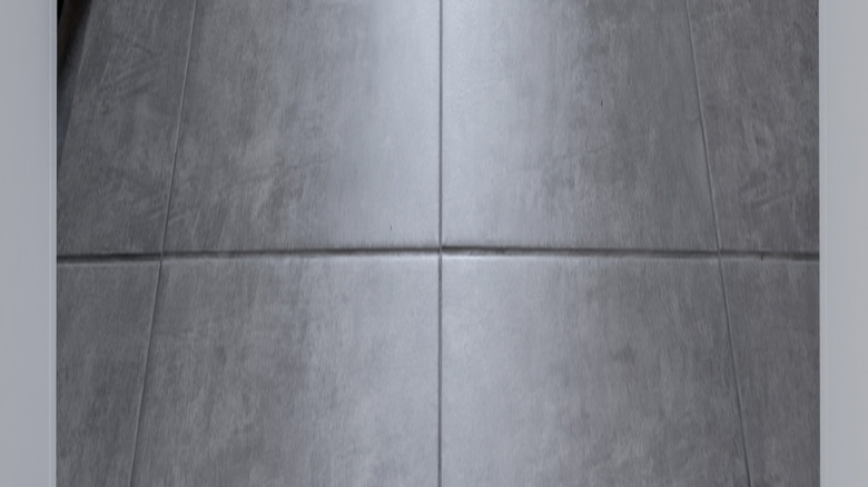 Gray tile in entryway of home