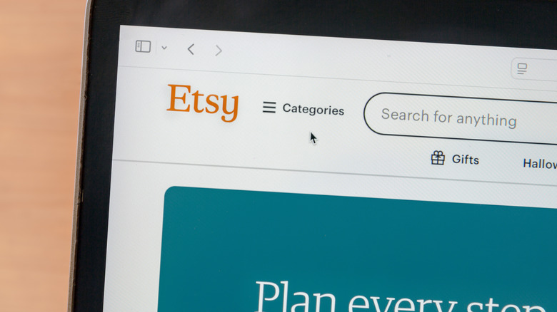 Laptop displaying the Etsy website.
