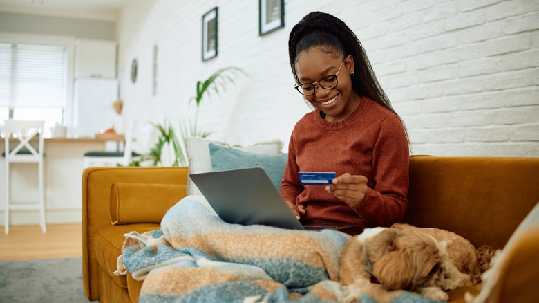Woman shopping online from the comfort of her home.