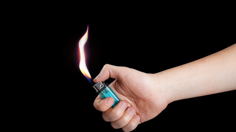 Lighting a butane lighter 