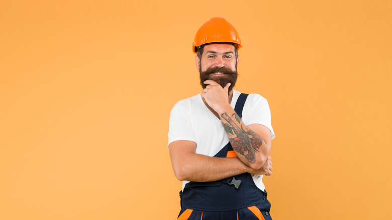 Builder smiling at the camera