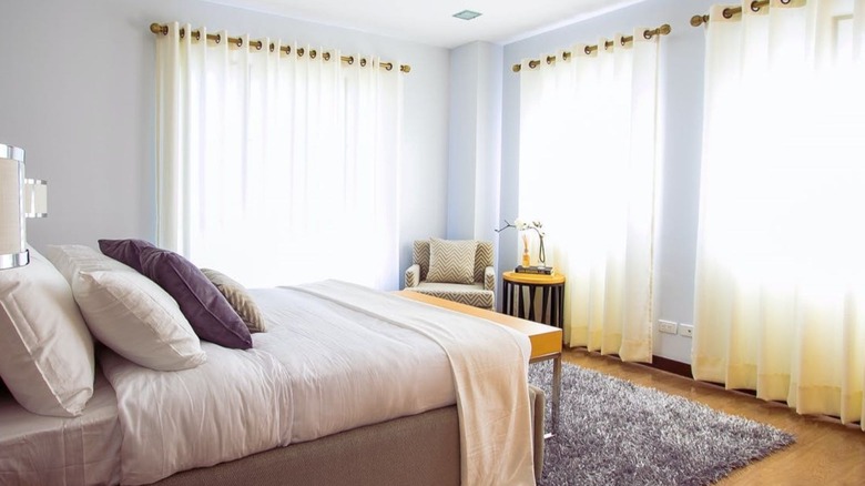 sheer white curtains in bedroom