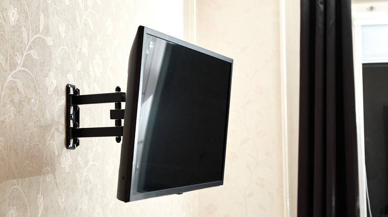 TV hanging on a wall