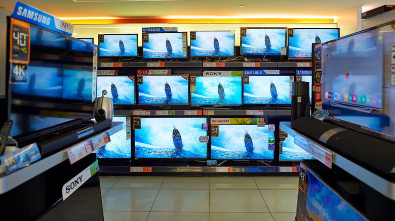 several televisions in a store