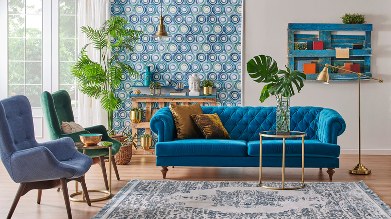 living room with blue wallpaper panel