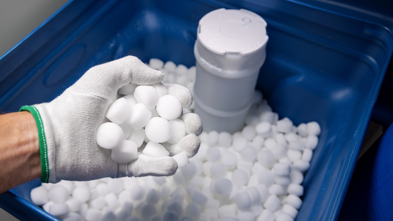 Adding salt to a water softener