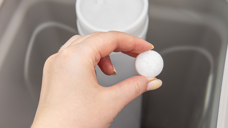 Addding salt to a water softener