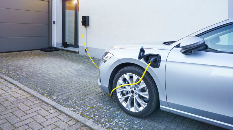 Home EV charger in driveway