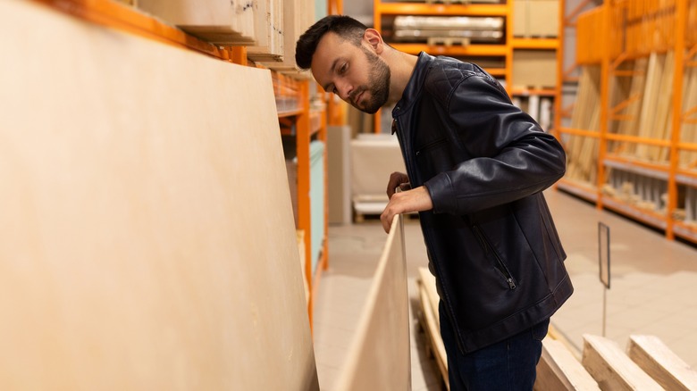 Man shopping for plywood