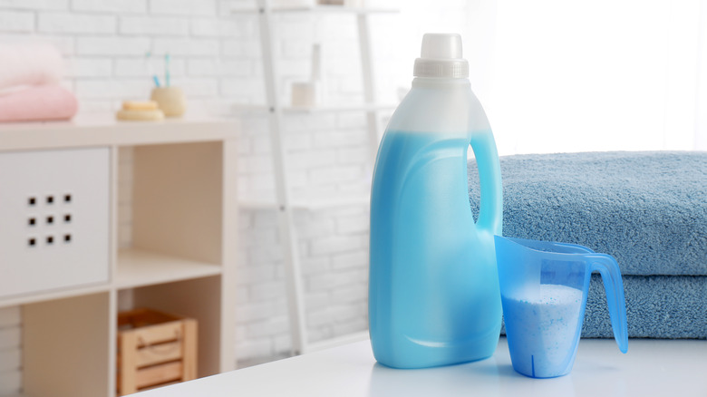 detergent with measuring cup