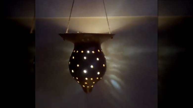 A gourd lantern with lights inside