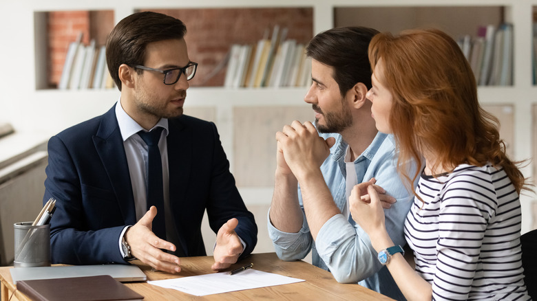 broker advises young couple