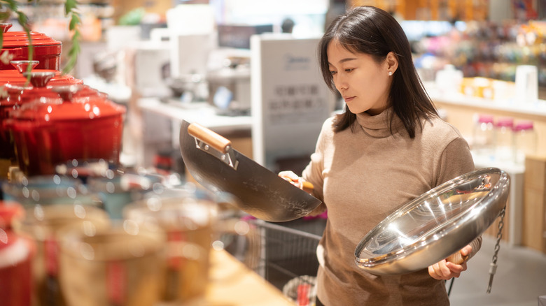 Someone shopping for cookware