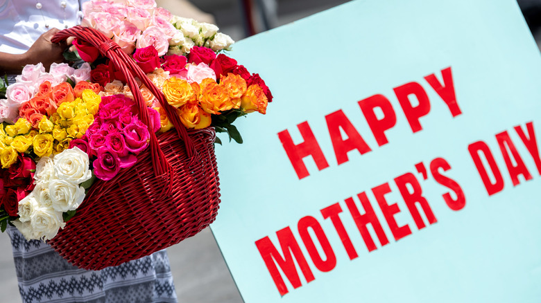 floral bouquet and mother's day sign