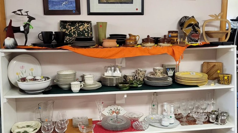 Vintage dinnerware and unique home decor in a thrift store
