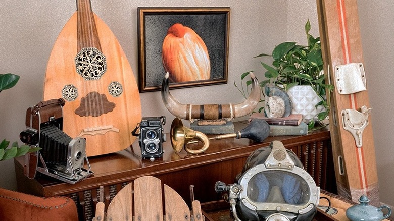 Different types of decor items on display at a thrift store