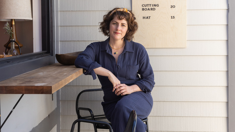 Lindsey Kurowski sitting on stool