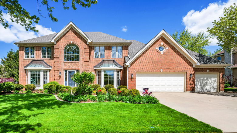 House with green grass