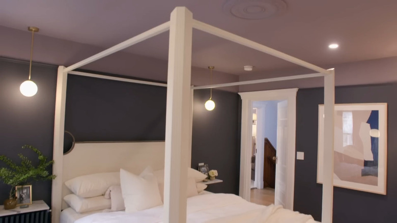 Room with dark purple walls and a light purple ceiling