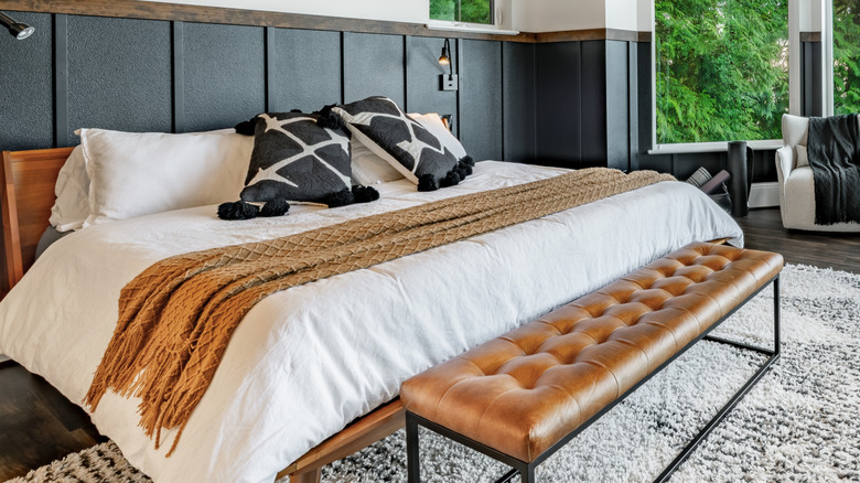 Bedroom with cozy-styled bed