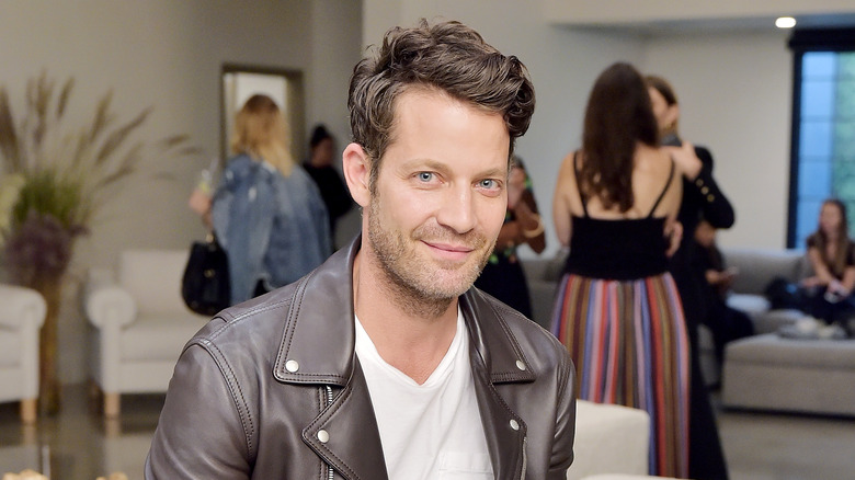 Nate Berkus smiles at an event.