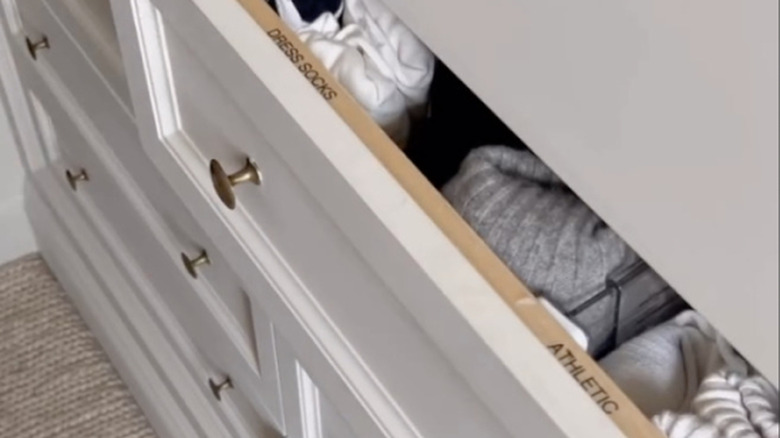 Clothing drawers with labels placed on the inner lip