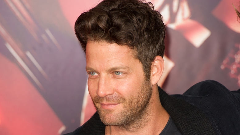 Nate Berkus poses at an event