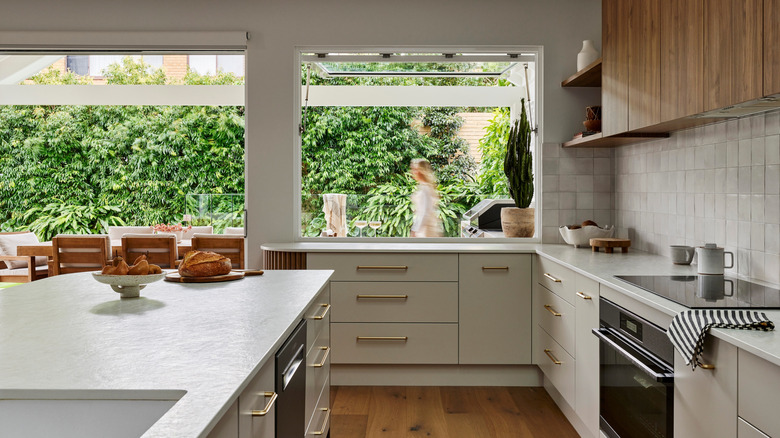 A modern kitchen with Zellige tiles and quality cabinetry