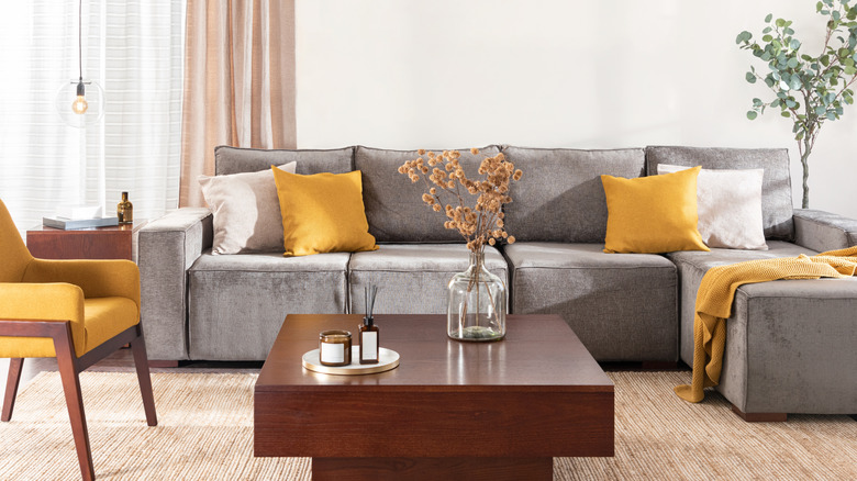 Mid-century modern living room with sectional and coffee table