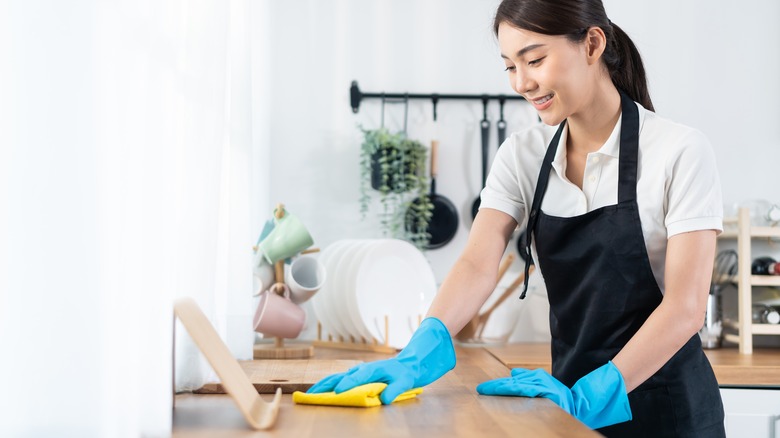 woman cleaning house