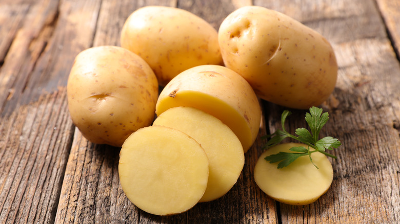 potatoes on wood board