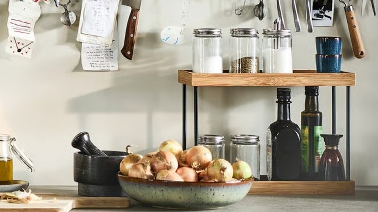 A two tiered bamboo countertop organizer from IKEA