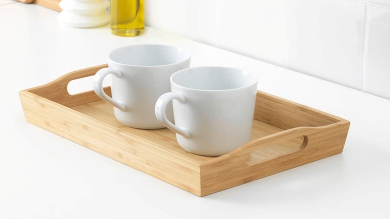 A bamboo tray from IKEA with two cups on it