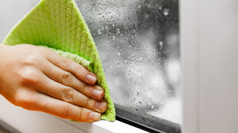 Hand wiping window condensation