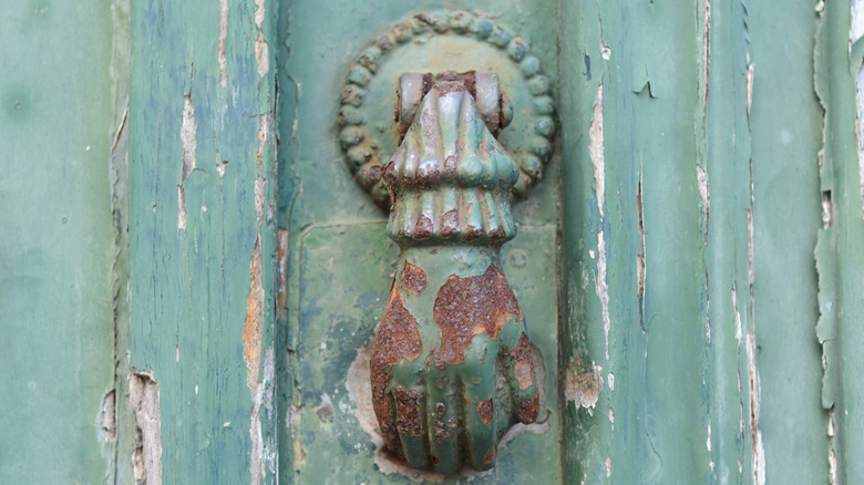 paint peeling off door knocker