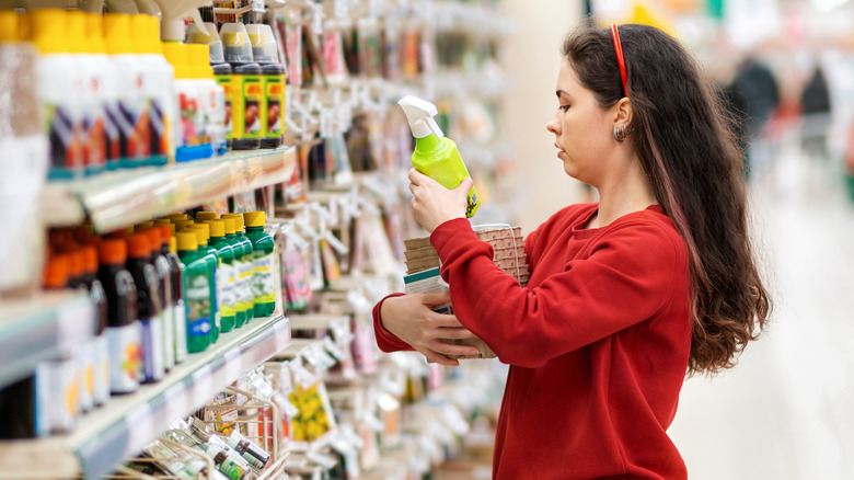 Woman shopping for plant products